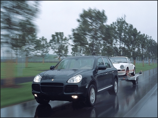 2004 Porsche Cayenne Turbo tows a 911 RS (Photo: Porsche)